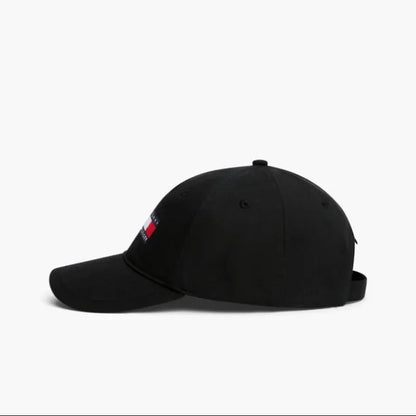 Black cap with a small flag patch on a white background